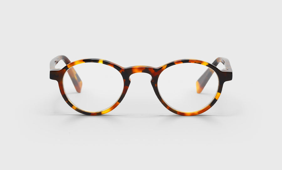 19_eyebobs premium designer board stiff readers, blue light and prescription glasses in tortoise front and temples, front