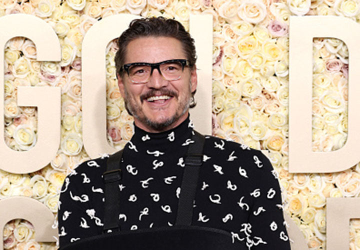 Pedro Pascal Wearing Black to Clear Fade Glasses