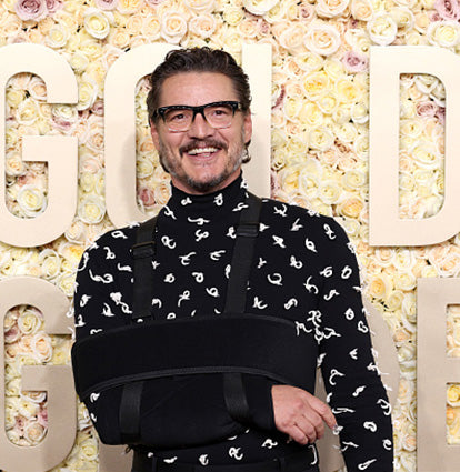 Pedro Pascal Wearing Black to Clear Fade Glasses